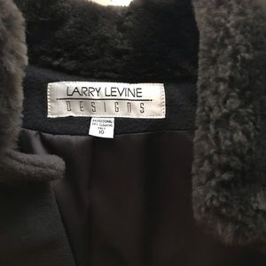 🕴️Very dark brown long coat.